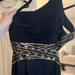 Deep Navy Open Back Prom Dress with Gold Detailing